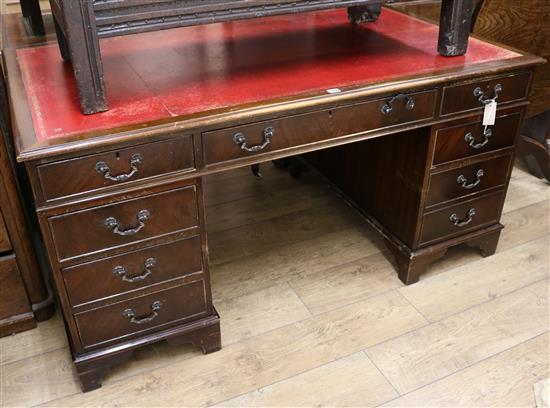 A Georgian style mahogany pedestal desk W.150cm